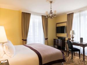 TV a/nebo společenská místnost v ubytování Hotel Rotary Geneva - MGallery