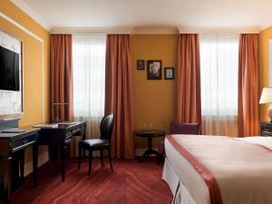 Postel nebo postele na pokoji v ubytování Hotel Rotary Geneva - MGallery