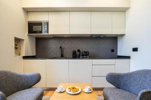 Kuchyň nebo kuchyňský kout v ubytování Gigantones GuestHouse