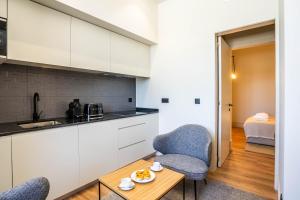 Kuchyň nebo kuchyňský kout v ubytování Gigantones GuestHouse