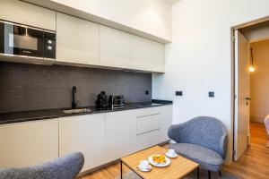 Kuchyň nebo kuchyňský kout v ubytování Gigantones GuestHouse