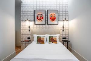 Postel nebo postele na pokoji v ubytování Gigantones GuestHouse