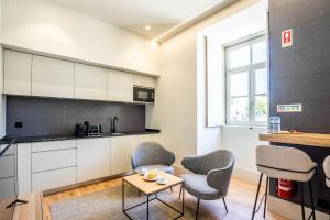 Kuchyň nebo kuchyňský kout v ubytování Gigantones GuestHouse