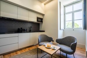 Kuchyň nebo kuchyňský kout v ubytování Gigantones GuestHouse