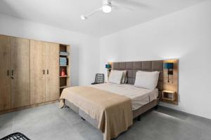 Ένα ή περισσότερα κρεβάτια σε δωμάτιο στο Bonaire Beach Apartment 1 with communal pool and diving facilities +23 φωτογραφίες