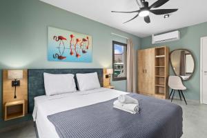 Postel nebo postele na pokoji v ubytování Bonaire Beach Apartment 4 with communal pool and diving facilities