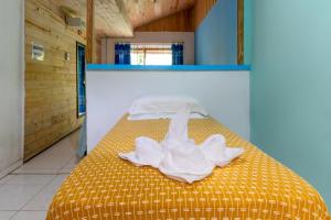 Cama ou camas em um quarto em Pousada Canto da Sereia