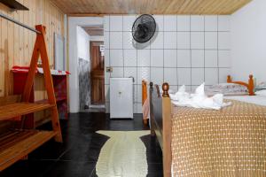 Cama ou camas em um quarto em Pousada Canto da Sereia