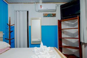 Cama ou camas em um quarto em Pousada Canto da Sereia