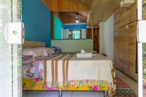 Cama ou camas em um quarto em Pousada Canto da Sereia