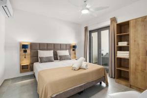 Postel nebo postele na pokoji v ubytování Bonaire Beach Apartment 8 with communal pool and diving facilities