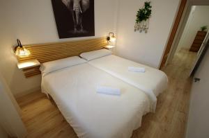 Postel nebo postele na pokoji v ubytování Livingtarifa Apartamento Agaporni