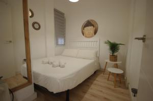 Postel nebo postele na pokoji v ubytování Livingtarifa Apartamento Agaporni