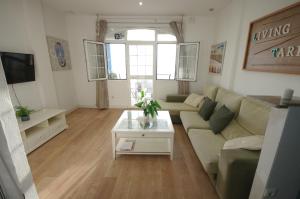 Posezení v ubytování Livingtarifa Apartamento Agaporni