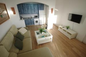 Posezení v ubytování Livingtarifa Apartamento Agaporni