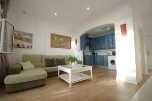 Posezení v ubytování Livingtarifa Apartamento Agaporni