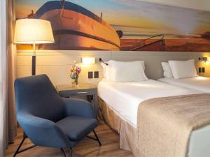Postel nebo postele na pokoji v ubytování Novotel Florianopolis
