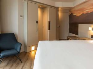 Postel nebo postele na pokoji v ubytování Novotel Florianopolis