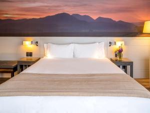 Postel nebo postele na pokoji v ubytování Novotel Florianopolis