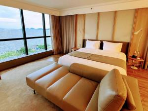 Postel nebo postele na pokoji v ubytování Novotel Florianopolis