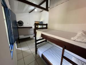 Postel nebo postele na pokoji v ubytování Ooxe Hostel