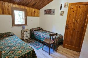 Postel nebo postele na pokoji v ubytování Villa Alba