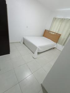 Postel nebo postele na pokoji v ubytování Casa Porto Belo