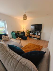 Μια τηλεόραση ή/και κέντρο ψυχαγωγίας στο Tierhogar Lane