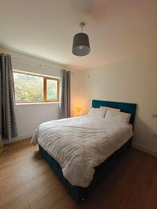 Ένα ή περισσότερα κρεβάτια σε δωμάτιο στο Tierhogar Lane