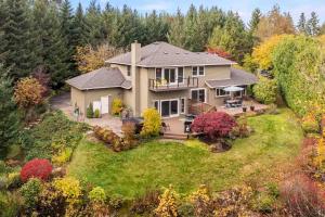 an aerial view of a house with a yard at Cooper Haven in Beaverton