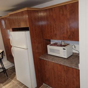 Kuchyň nebo kuchyňský kout v ubytování Chambre vu à couper le souffle