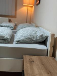 Postel nebo postele na pokoji v ubytování Royal Apartmani
