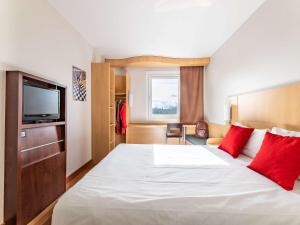 Postel nebo postele na pokoji v ubytování Ibis Hotel Plzeň