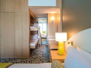 Postel nebo postele na pokoji v ubytování Sofitel Dubai Downtown