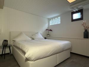 Ένα ή περισσότερα κρεβάτια σε δωμάτιο στο Ferienhaus Möhrle 1