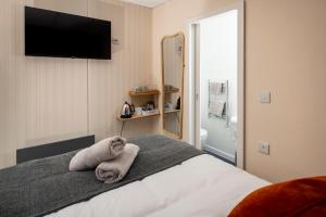 Postel nebo postele na pokoji v ubytování nodpod accomodation + 11 fotografií