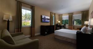 TV a/nebo společenská místnost v ubytování Prestige Oceanfront Resort, WorldHotels Luxury