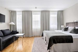 Postel nebo postele na pokoji v ubytování Best Western Plus Grand Hotel Elektra