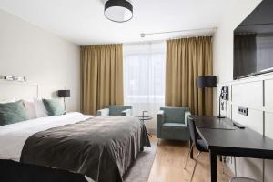 Postel nebo postele na pokoji v ubytování Best Western Plus Grand Hotel Elektra