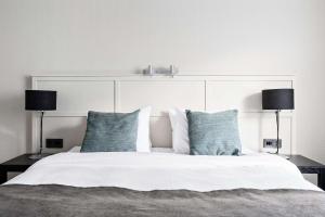 Postel nebo postele na pokoji v ubytování Best Western Plus Grand Hotel Elektra