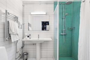 Koupelna v ubytování Best Western Plus Grand Hotel Elektra