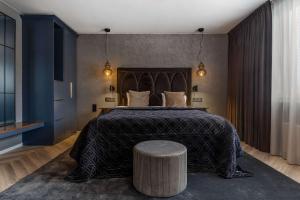 Postel nebo postele na pokoji v ubytování Best Western Plus Grand Hotel Elektra