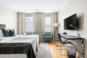 TV a/nebo společenská místnost v ubytování Best Western Plus Grand Hotel Elektra