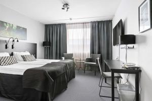 Postel nebo postele na pokoji v ubytování Best Western Plus Grand Hotel Elektra