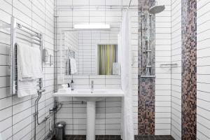 Koupelna v ubytování Best Western Plus Grand Hotel Elektra
