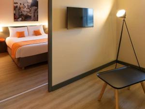Krevet ili kreveti u jedinici u okviru objekta ibis Styles Lyon Centre Confluence