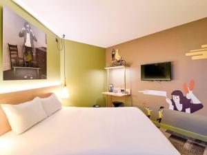 Krevet ili kreveti u jedinici u okviru objekta ibis Styles Lyon Centre Confluence