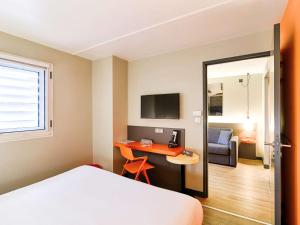 TV i/ili multimedijalni sistem u objektu ibis Styles Lyon Centre Confluence