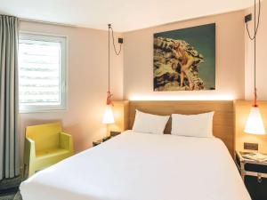 Krevet ili kreveti u jedinici u okviru objekta ibis Styles Lyon Centre Confluence
