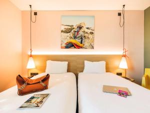 Krevet ili kreveti u jedinici u okviru objekta ibis Styles Lyon Centre Confluence